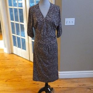 Wrap around, black and brown animal print mid length, short sleeved